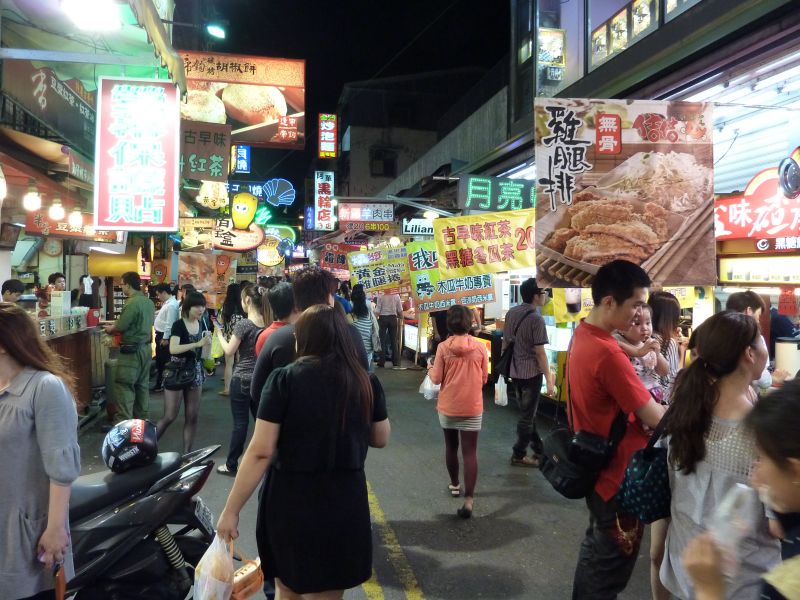 A busy evening scene at Fengjia Night Market in Taichung